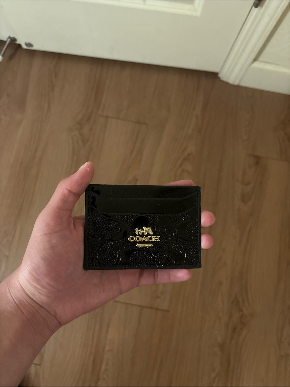 Coach Black Patent Leather Card Holder with Gold Logo